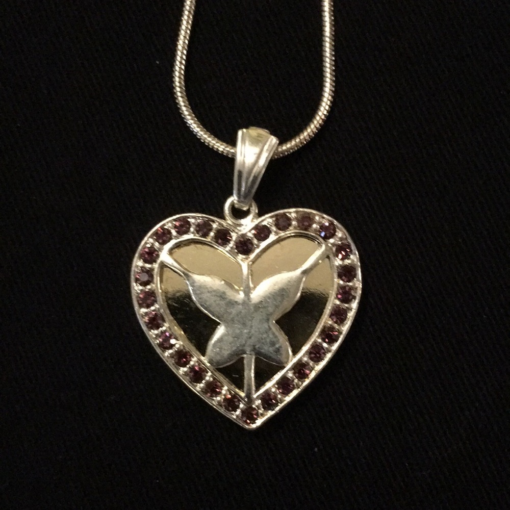 NWOT silver toned heart w butterfly necklace.